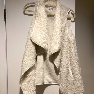White faux fur vest